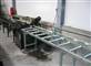 Rollenbaan type L - Gemonteerd aan zaagmachine